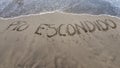 sand with hand drawing letters for beach travel and tropical tourism Royalty Free Stock Photo