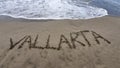 sand with hand drawing letters for beach travel and tropical tourism Royalty Free Stock Photo