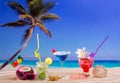 Beach tropical cocktails on white sand mojito blue hawaii Royalty Free Stock Photo