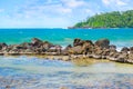 Beach tropical ocean with coral, palms trees and lagoon Royalty Free Stock Photo