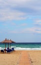 Beach umbrella and beds