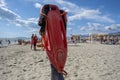 Beach umbrella, body guard buoy and fins