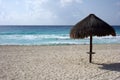 Beach umbrella on Caribbean sea coast, Cancun Royalty Free Stock Photo
