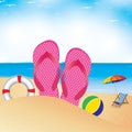 Beach umbrella with chair on the beach. Slipper and football in sand.