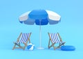 Beach umbrella with chairs and beach accessories on the bright blue background Royalty Free Stock Photo
