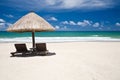 Beach umbrella and chairs with copyspace Royalty Free Stock Photo