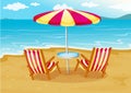A beach umbrella with chairs at the seashore