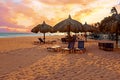 Beach umbrella`s on Druif beach at Aruba island in the Caribbean Royalty Free Stock Photo