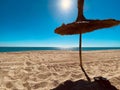 Beach umbrella on a sunny day in the mediterranean sea in Morocco Royalty Free Stock Photo