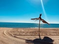 Beach umbrella on a sunny day in the mediterranean sea in Morocco Royalty Free Stock Photo