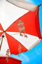 Beach umbrella and the wind bell Royalty Free Stock Photo