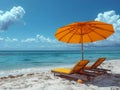 A beach umbrella yellow stuck in the sand with an empty lounge chair next to it.