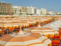 Beach umbrellas, gazebos and sun beds at Italian sandy beaches. Adriatic coast. Emilia Romagna, Itsly Royalty Free Stock Photo