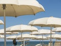 Beach umbrellas, gazebos and sun beds at Italian sandy beaches. Adriatic coast. Emilia Romagna, Itsly Royalty Free Stock Photo