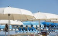 Beach umbrellas, gazebos and sun beds at Italian sandy beaches. Adriatic coast. Emilia Romagna, Itsly Royalty Free Stock Photo