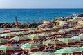 Beach umbrellas on an italian beach in Monterosso Royalty Free Stock Photo