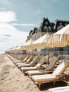 beach umbrellas and lounge chairs on a normandy beach in Cabourg style - generative AI Royalty Free Stock Photo
