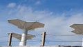 Beach umbrellas. Minimalistic architecture. Antenna.