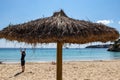 Beach umbrellas on Palmanova beach in Calvia Bol ses Taules Mallorca, spain