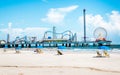 Beach umbrellas and Pleasure Pier amusement park