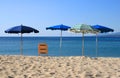 Beach umbrellas on the seaside Royalty Free Stock Photo