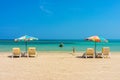 Beach umbrellas and sunbathe seats on Phuket sand beach Royalty Free Stock Photo