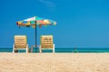 Beach umbrellas and sunbathe seats on Phuket sand beach Royalty Free Stock Photo