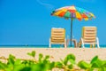 Beach umbrellas and sunbathe seats on Phuket sand beach Royalty Free Stock Photo