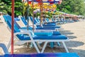 Beach umbrellas and sunbathe seats on Phuket sand beach in South Royalty Free Stock Photo