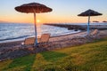 Beach umbrellas and sunbeds Royalty Free Stock Photo