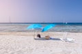 Beach umbrellas on white sand under the hot Ibiza sun. Balearic Islands. Spain Royalty Free Stock Photo