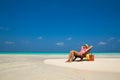 Beach vacation. Hot beautiful woman enjoying looking view of beach Royalty Free Stock Photo