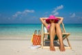 Beach vacation. Hot beautiful woman enjoying looking view of beach