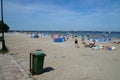 Beach with vacationers on the coast of the Baltic Bay in the village of Rewa, Poland Royalty Free Stock Photo