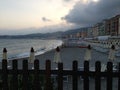 The Beach in Varazze with empty sun chairs and umbrellas before the storm rolls