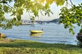 Beach view in Fethiye, Turkey, Beautiful beach scene and fishing boat Royalty Free Stock Photo