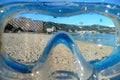 Beach view through a snorkel mask