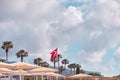 Beach view on turkish beach on turkey flag, umbrellas, bright sunny weather. travel Turkey background concept. Copy