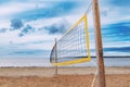 Beach volleyball net on sandy terrain of Halmstad West beach on overcast summer day