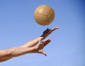 Beach volleyball player, playing summer. Woman with ball. A woman serving ball