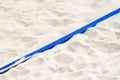 Beach volleyball, soccer, handball court up close and in detail with blue plastic line marker Royalty Free Stock Photo