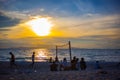 Beach Volleyball at sunset and pier Royalty Free Stock Photo