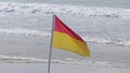 Beach Warning Flags to indicate the sea hazard on a sandy beach Royalty Free Stock Photo