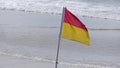 Beach Warning Flags to indicate the sea hazard on a sandy beach Royalty Free Stock Photo