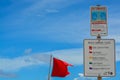 Beach warning signs and flags, Jacksonville Beach, Duval County, Florida. Royalty Free Stock Photo