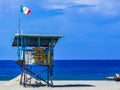 Beach watchtower with Mexican flag in Puerto Escondido Mexico