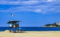 Beach watchtower with Mexican flag in Puerto Escondido Mexico