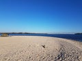 beach and water and bridge at Solomons Island Maryland with tent Royalty Free Stock Photo