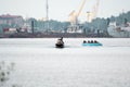 Beach water sports tubing with tourist being pulled by jetski in a beach in batam indonesia, Indonesia, May 4, 2019 Royalty Free Stock Photo