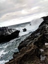 Beach Waves Crashing Against Rocks Royalty Free Stock Photo